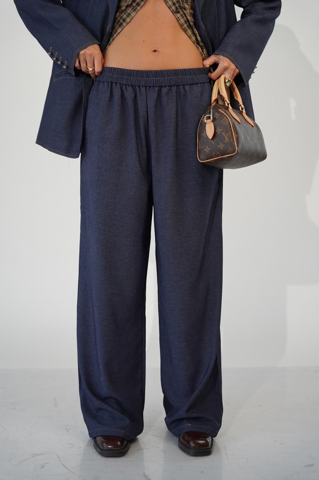 חליפת קלודין גינס – תמונה 2