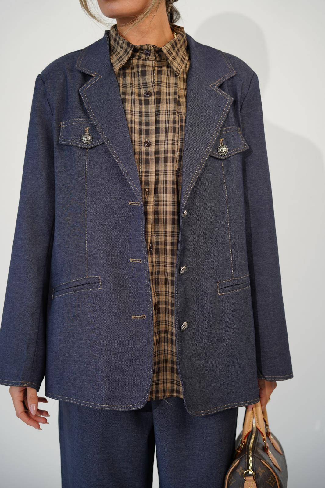 חליפת קלודין גינס